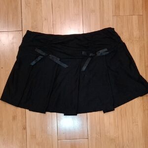 Chic Black Mini Skirt with Bow Accents